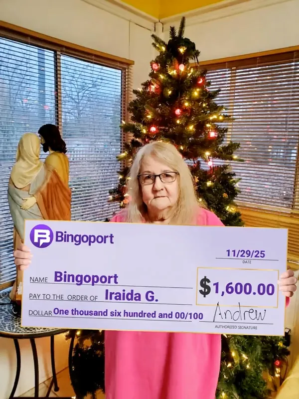 Iris with their winning cheque